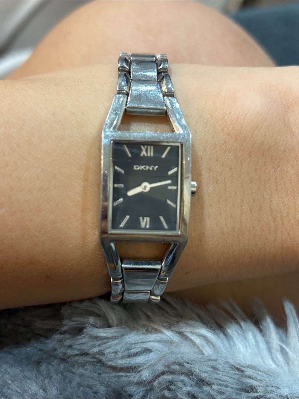 DKNY Silver Bracelet Watch with Black Dial and Roman Markers